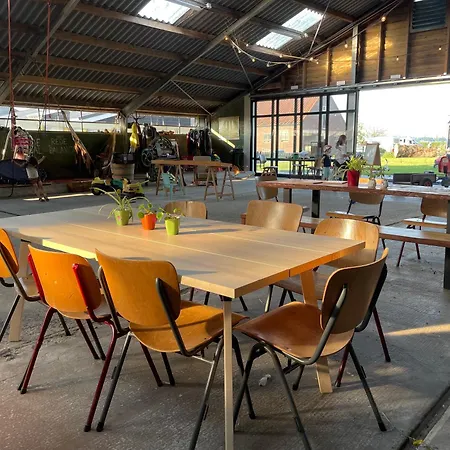 Vintage Caravan In Old Orchard At Farm Huize Blokland